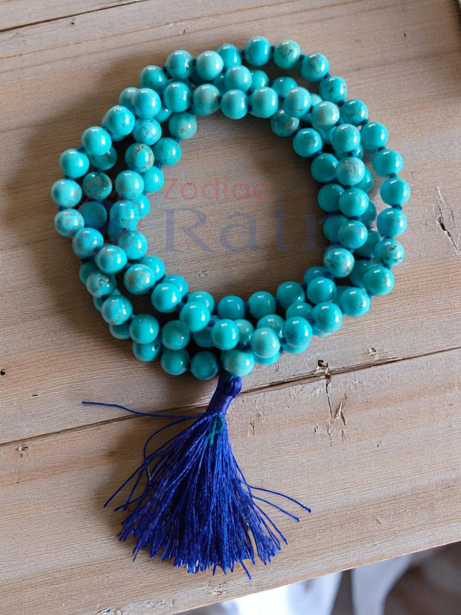 Calming blue Firoza mala to enhance intuition, creativity, and serenity