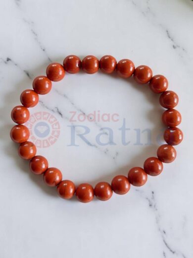 Close up of natural Red Jasper gemstones rich earthy tones empowering energy