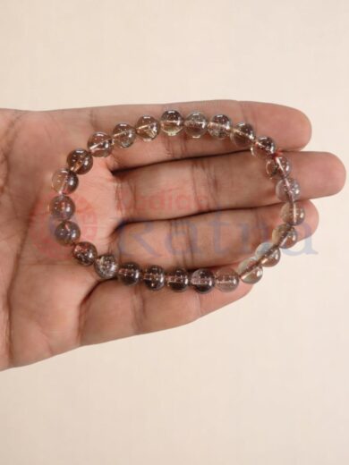 Close up of natural Smokey Quartz gemstones deep smoky hues grounding energy